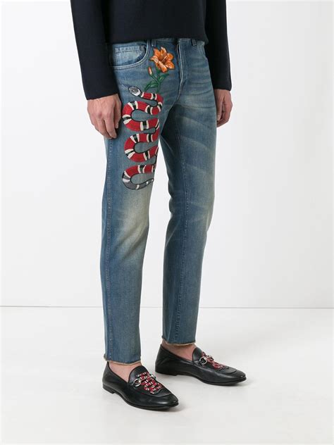 gucci jeans with snake